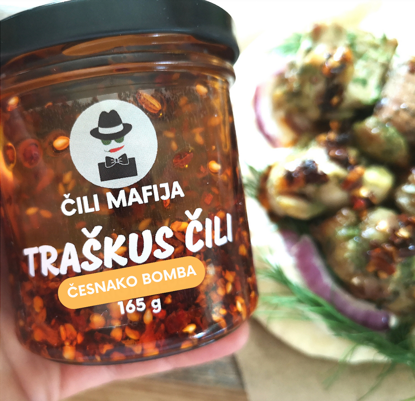 An extra garlicky crispy chilli oil, a bold and flavourful condiment that combines the fiery heat of chillies with the robust, aromatic punch of chunky garlic.