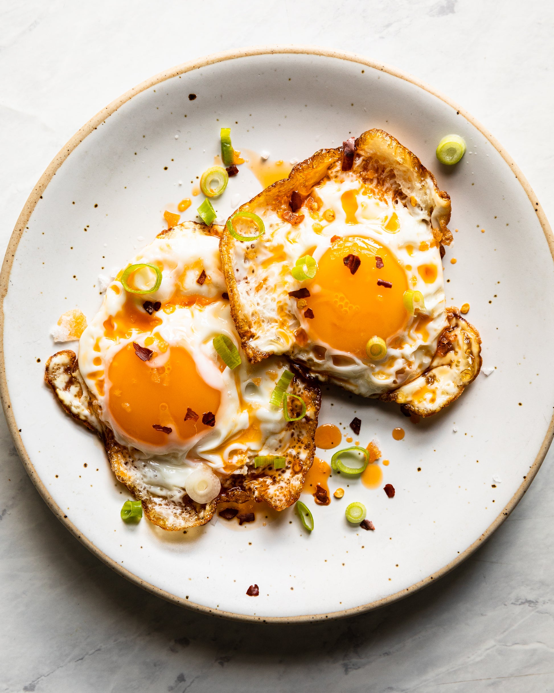 fried eggs with Čili Mafija crispy chilli oil